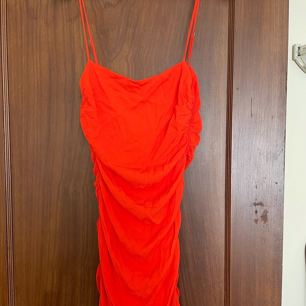 We wore what small red ruched dress